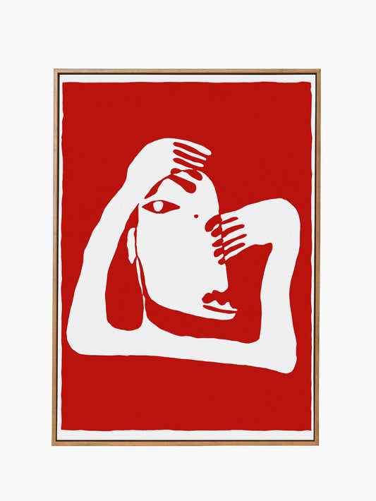Framed artwork of a stylized white figure on a red background